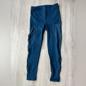 Lululemon workout pants. Mesh on sides and lower legs.